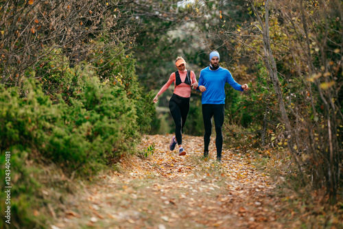 Happy Couple Running on a Forest Trail