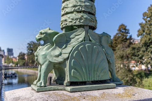 Ljubljana, Slovenia. Griffin Sculptures at Dragon Bridge.. photo