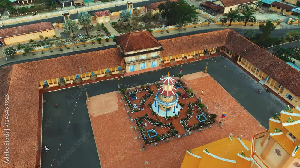Aerial View Of Holy See of Cao Dai, Cao Dai Temple, Tay Ninh, Vietnam Travel.
Soar above the iconic temple complex, marveling at its unique blend of architectural styles and vibrant colors. 