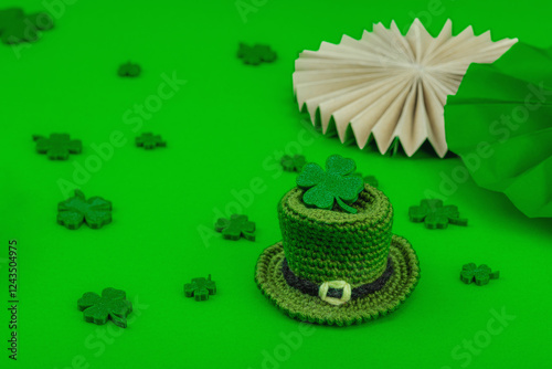 Handmade St. Patrick's Day concept. Traditional decorative symbols, crocheted leprechaun hat photo