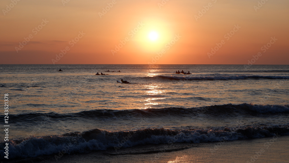 Sunset golden hour at Kuta Beach on Bali Island, Indonesia Sunset golden hour at Kuta Beach on Bali Island, Indonesia