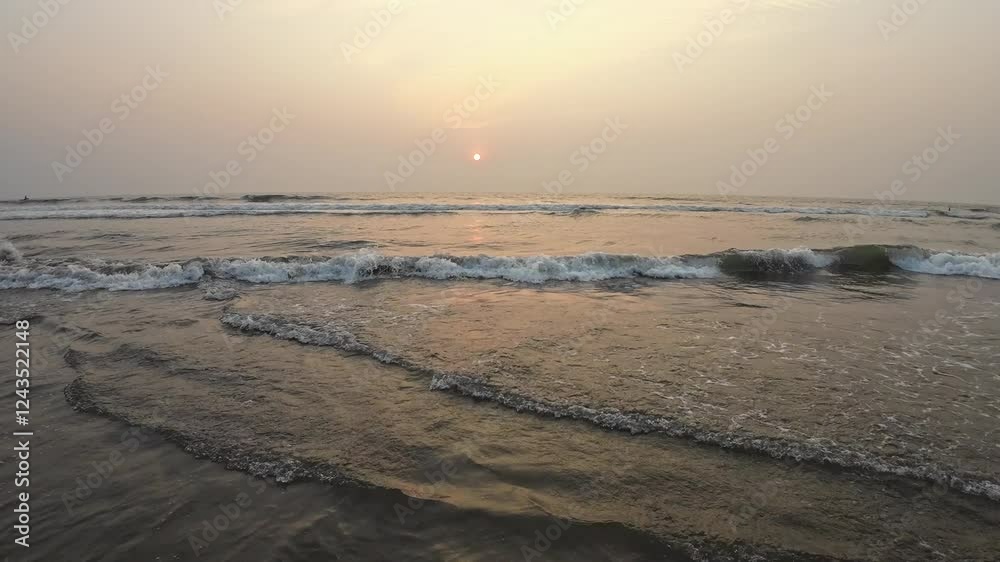 Rolling Ocean Waves At Black Sand Beach Sunset Sky Reflect On Beach Sand