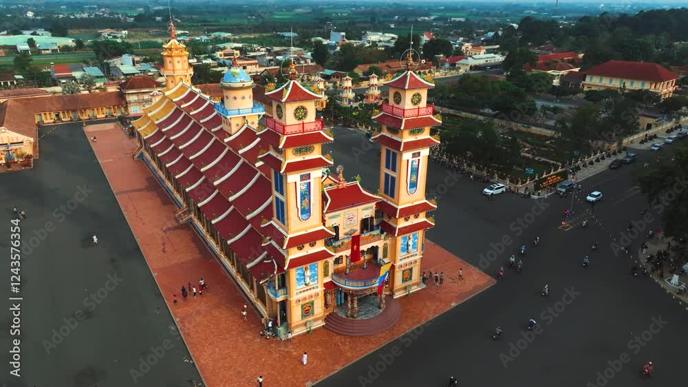Aerial View Of Holy See of Cao Dai, Cao Dai Temple, Tay Ninh, Vietnam Travel.
Soar above the iconic temple complex, marveling at its unique blend of architectural styles and vibrant colors. 