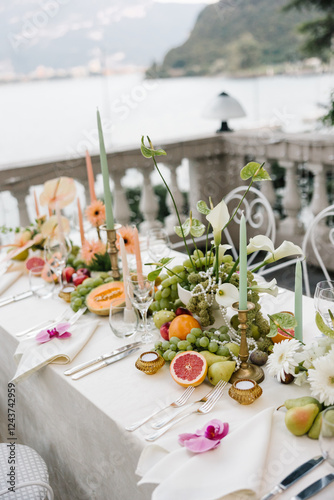 Elegant Wedding Table Details: Anthuriums, Pearls, and Tropical Fruits