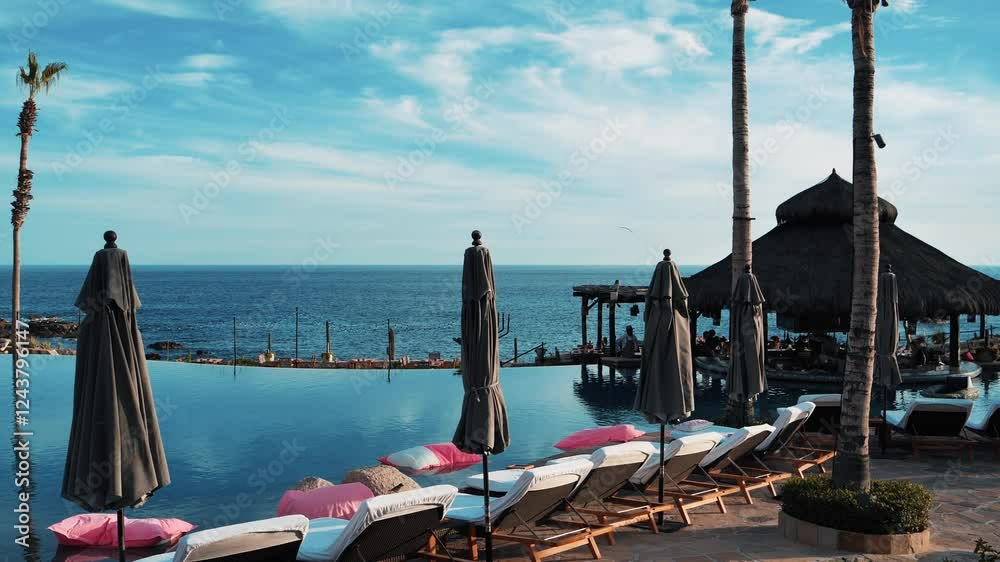 Stunning Luxury Hotel Pool at Sunset in Cabo San Lucas, Mexico August 11, 2024 Stunning Luxury Hotel Pool at Sunset in Cabo San Lucas, Mexico August 11, 2024