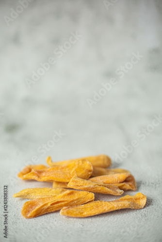 dried mangon fruit on the table photo