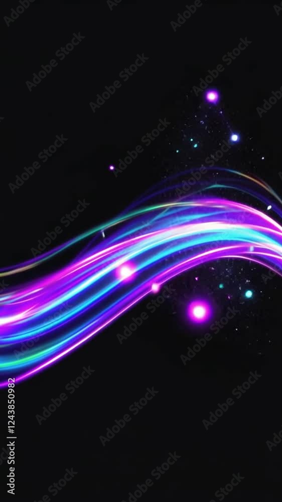 Abstract multicolored string of light in black background. Bright particles in row with luminous effects. Ray of lights pulsating in dark backdrop