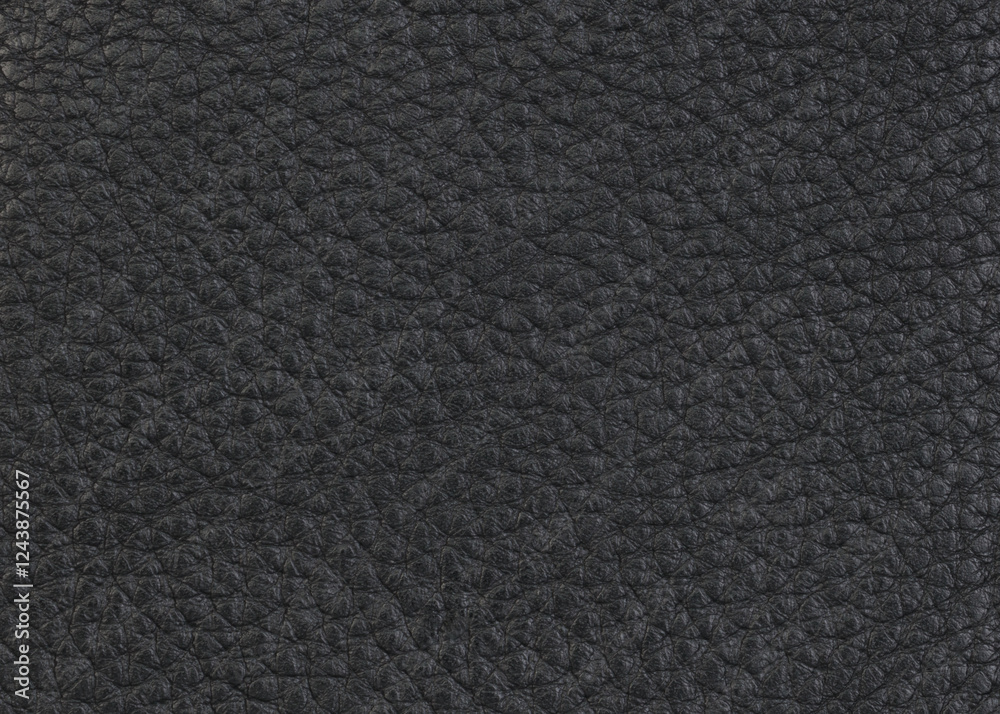 Fototapeta premium Close up of a black leather surface with detailed texture ideal for backgrounds and design projects