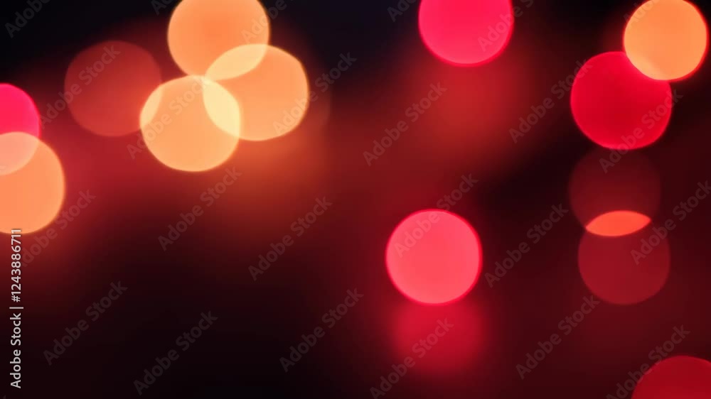 red bokeh lights floating on black seamless looping motion background