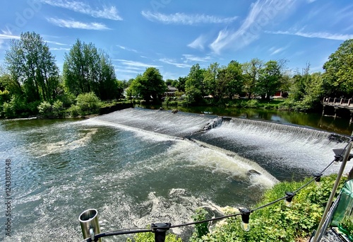 Water flowing over a weir on the River Derwent, Derby, UK. 