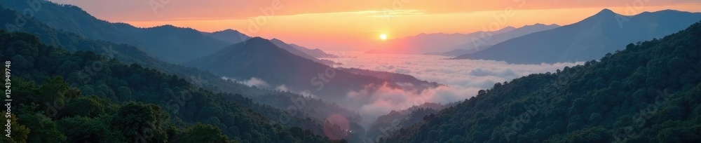 Obraz premium Mists rise from river valley as sunrise breaks through mountains, river valley, forest