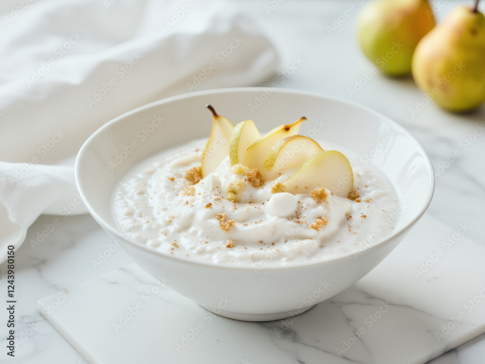 professional advertisement food photography: A bowl of oatmeal topped with pears and whipped cream. professional advertisement food photography: A bowl of oatmeal topped with pears and whipped cream.