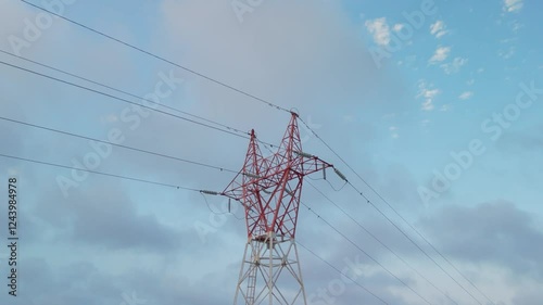 Aerial Shot High-Voltage Power Poles Spanning Canada And The U.S., Delivering Electricity. The Video Highlights The Essential Role Of Energy Transmission Amid Rising Tensions Between The Two Nations.