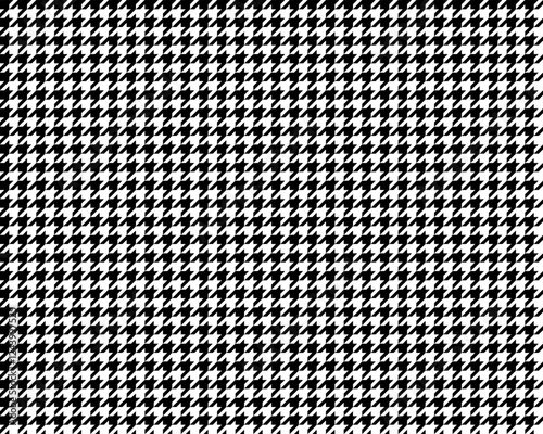 Houndstooth seamless pattern. Repeated houndtooth texture. Black hound tooth on white background. Repeating pepita plaid patern for design prints. Simple abstract plaid dogstooth. Vector illustration