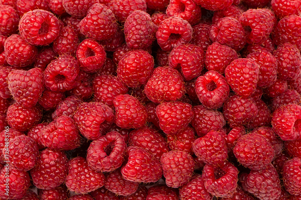 Tasty fresh raspberry as a background. Tasty fresh raspberry as a background.