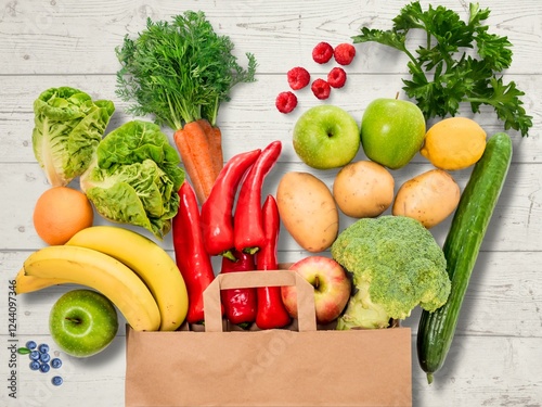 paper bag vegetables fruits on wooden
