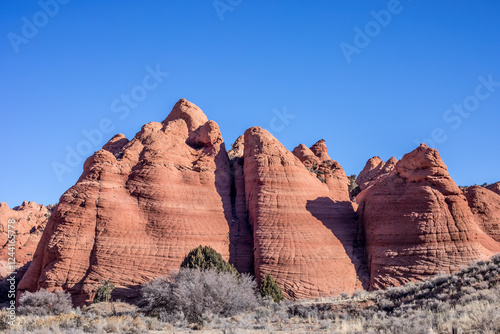 Unique Rock Formation Against Blue Sky