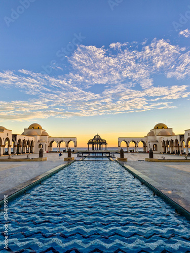 fountain and center of the promenade of the seaside resort of Sahl Hasheesh in Egypt at sunset