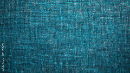 Turquoise coloured textured background with woven thread weave pattern, burlap