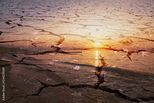 Dry ground as background with sunset.