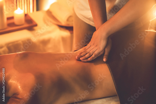 Wallpaper Mural Caucasian woman customer enjoying relaxing anti-stress spa massage and pampering with beauty skin recreation leisure in warm candle lighting ambient salon spa at luxury resort or hotel. Quiescent Torontodigital.ca