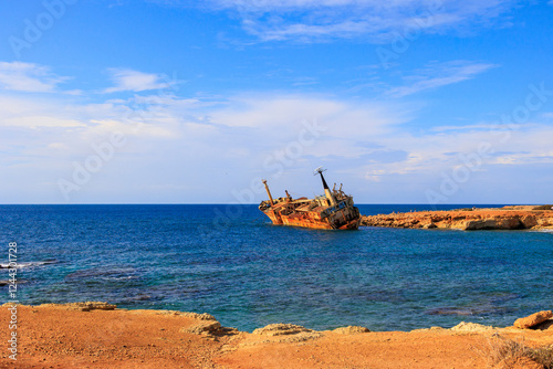 Rusted Shipwreck Edro III Stranded on the Rocky Coast of Paphos, Cyprus photo