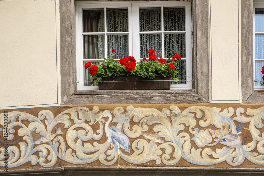 Fototapeta premium Frescoes depicting village life on the painted houses of the old town of Stein am Rhein, Canton Schaffhausen, Switzerland
