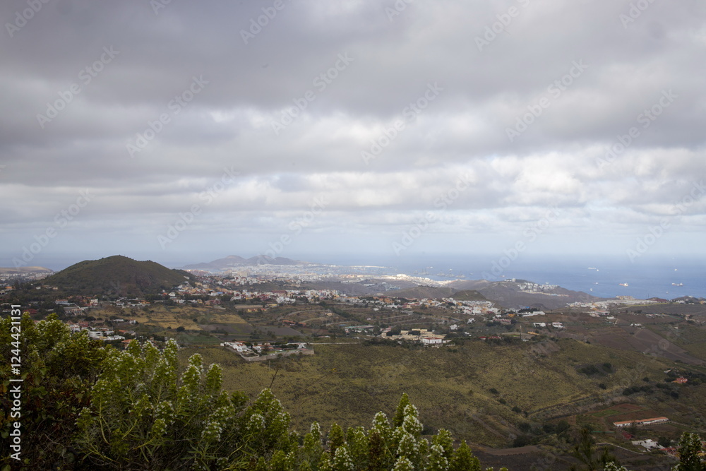Rugged mountain landscape Bandama Caldera, Gran Canaria, with a prominent rock cliff or outcrop.