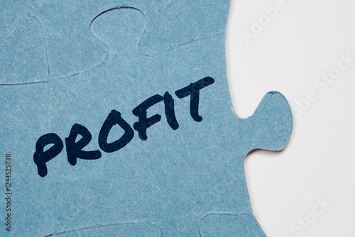 Profit text on puzzle pieces
