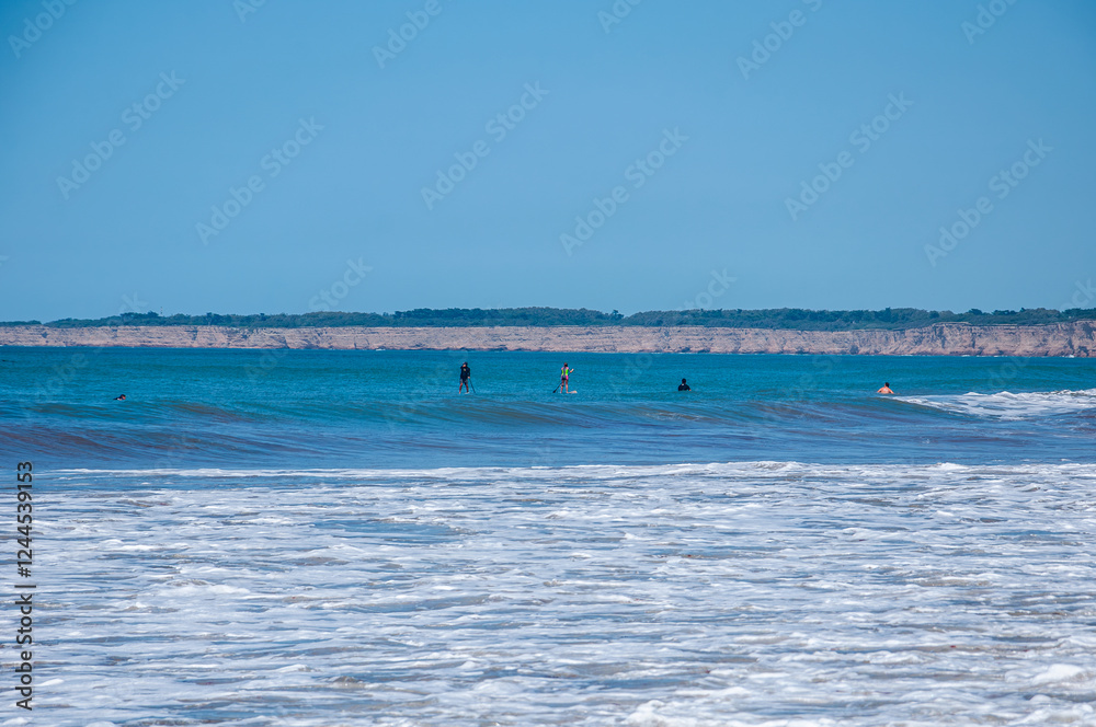 View of the beaches of Mar del Plata with the cliffs in the background on a sunny day View of the beaches of Mar del Plata with the cliffs in the background on a sunny day