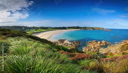 Tranquil Sunset over Fermain Bay, Guernsey Secluded Cove Bathed in Glowing Amber Hues, Surrounded by Limestone Cliffs and Lush Greenery.