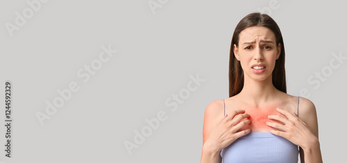Young woman with red sunbur...