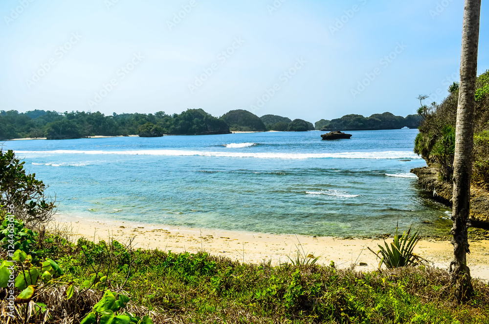 Crystal-Clear Water Lapping onto a White Sandy Shore Crystal-Clear Water Lapping onto a White Sandy Shore