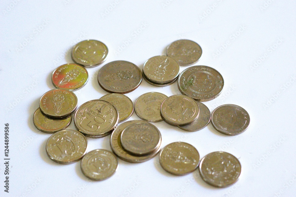 heap of coins isolated on white background heap of coins isolated on white background