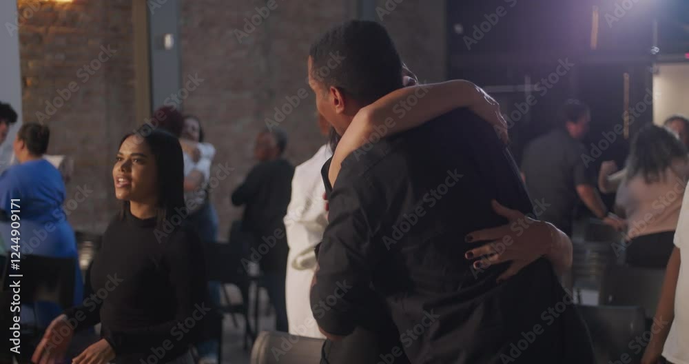 Diverse congregation members exchanging hugs and smiles in a modern church setting, creating a sense of community, connection, and shared spirituality