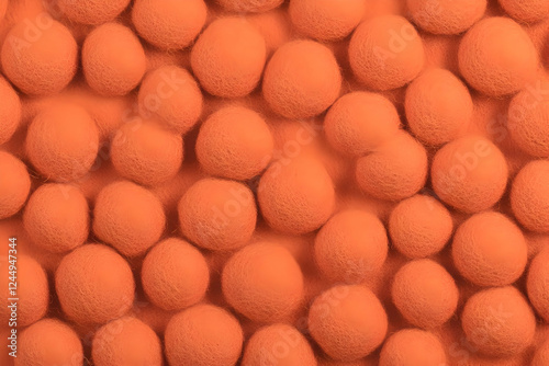 Close-Up of Orange Felt Bal...