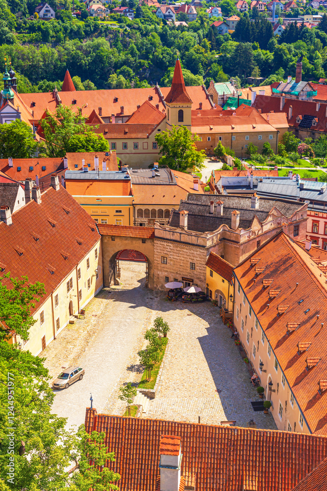 Summer cityscape - top view of the courtyard of Cesky Krumlov Castle and historic district Latran of Cesky Krumlov, Czech Republic