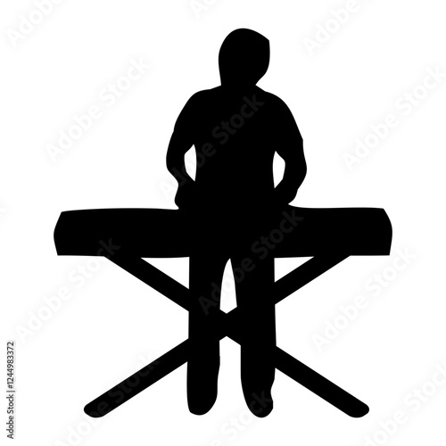 silhouette of person playing keyboard while standing