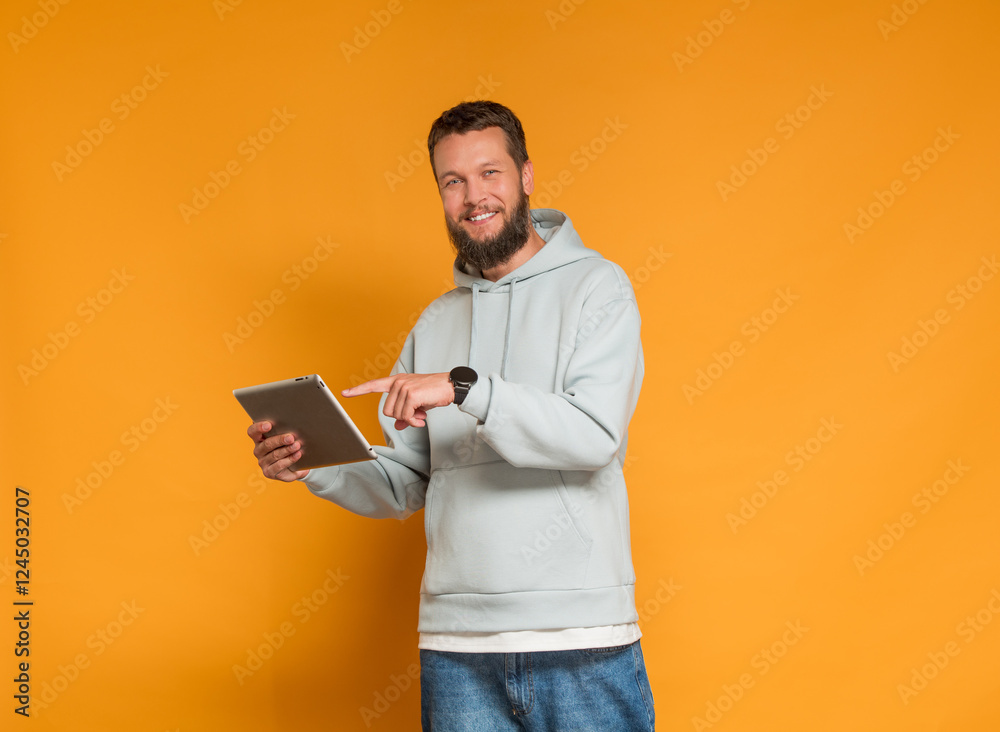 modern bearded man with tablet recommends approves something modern bearded man with tablet recommends approves something