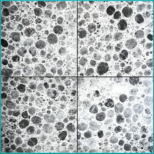 Four Tiles Seamlessly Display a Textured Surface with Rounded Shapes in Monochrome Hues.