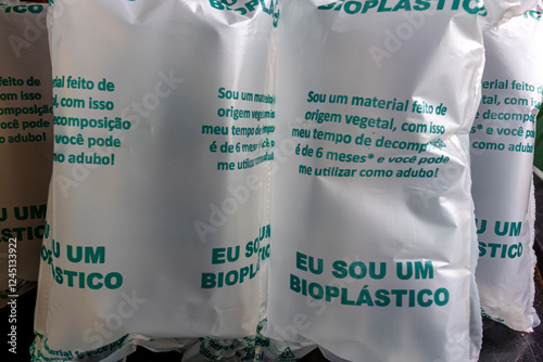 Bioplastic, biodegradable plant-based material that decomposes in 6 months and can be used as fertilizer. Written in Portuguese on the product. 