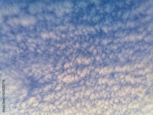 Blue sky background. Beautiful morning sky with clouds 