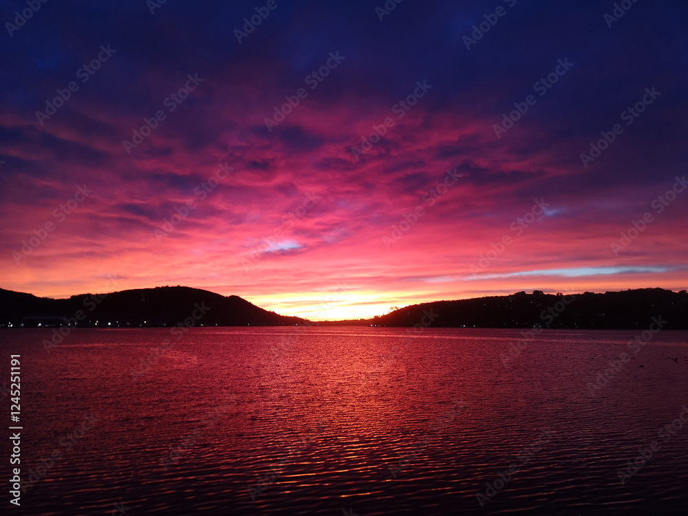 Fototapeta premium The sun rising over Dunedin, Otago region, New Zealand