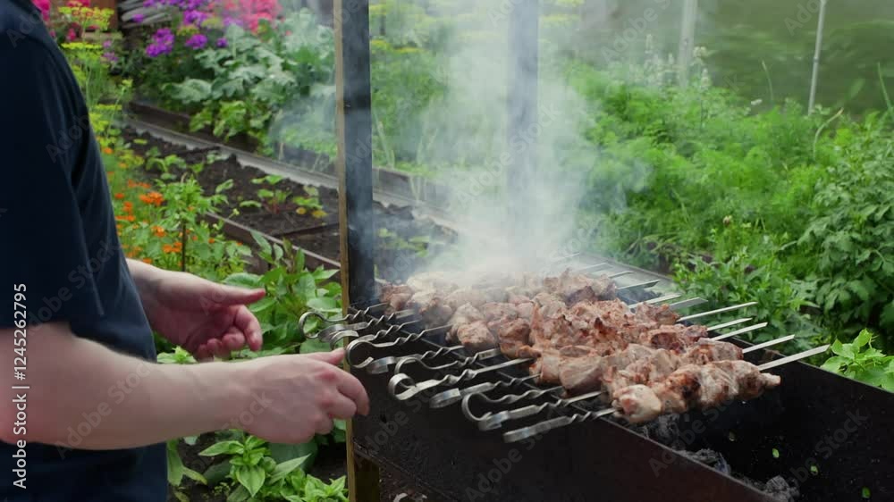 Skilled chef preparing savory meat skewers on metal grill, rising smoke surrounding sizzling embers in lush garden setting during outdoor summer cooking Skilled chef preparing savory meat skewers on metal grill, rising smoke surrounding sizzling embers in lush garden setting during outdoor summer cooking