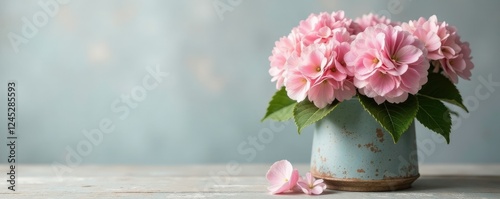 Pale pink hydrangeas in a distressed wood and metal vase, rustic, vase