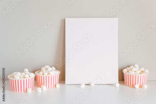 Stylish marshmallow boxes with white empty canva. Mockup for design, template