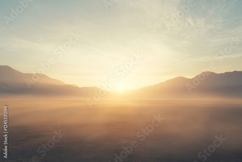 Tranquil sunrise over misty mountain landscape with soft morning light