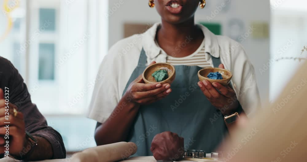 Hands, pottery class and sculpting clay with people in workshop for art and crafts demonstration. Learning, presentation and skill with master potter teaching students in studio how to shape material