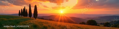 Morning sun rises behind cypress trees in Florence sky, SunRise, Tuscan Countryside, ItalianSkyline photo