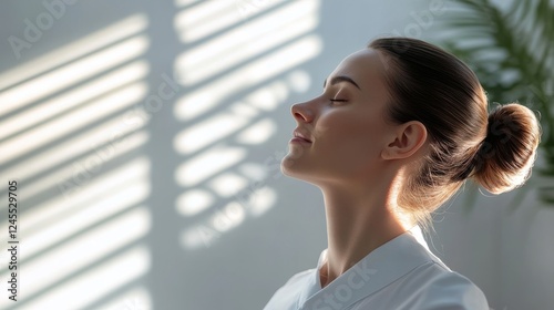 Free Download therapeutic neck treatment session, serene wellness environment, diagonal window shadows, minimalist medical space, skilled practitioner pose, gentle healing touch, documentary style - GFXLoad